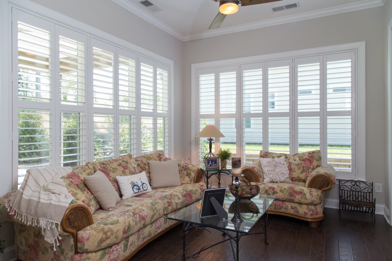 Sunroom with plantation shutters in Tampa.